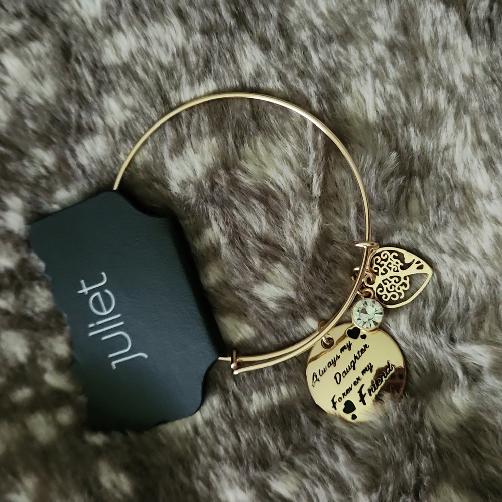 Gold tone charm bracelet